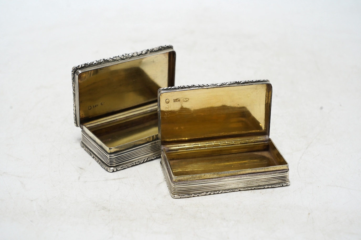 Two late William IV engine turned silver rectangular snuff boxes, Francis Clark, Birmingham, 1835/6, largest 70mm. Condition - fair